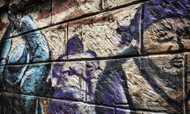 REUTERS — Too good to be true? Slum graffiti warns Kenyans about trafficking risks